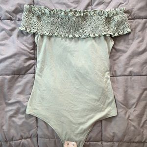 Sleeveless off the shoulder body suit